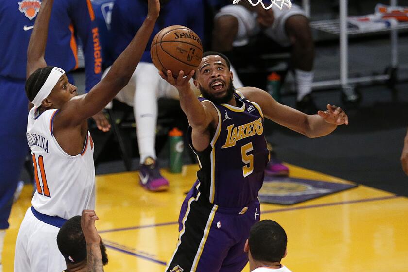 LOS ANGELES, CA - MAY 11: Los Angeles Lakers guard Talen Horton-Tucker (5) drives to the basket.