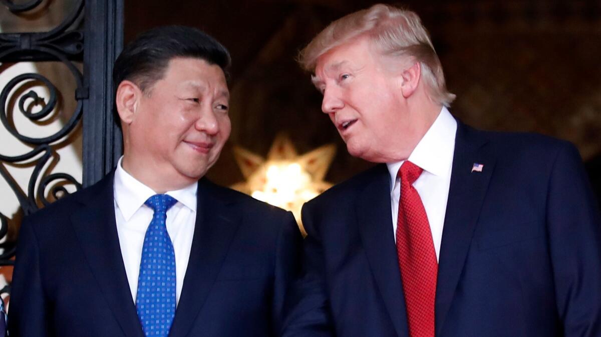 Chinese President Xi Jinping, left, with President Trump before their dinner at the Mar-a-Lago estate in Palm Beach, Fla., on April 6, 2017.