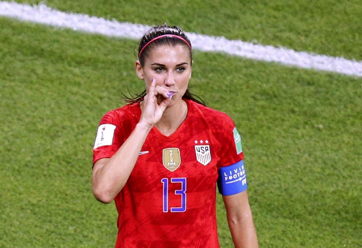 FILE - In this Tuesday, July 2, 2019 file photo, United States' Alex Morgan celebrates her side's second goal during the Women's World Cup semifinal soccer match between England and the United States, at the Stade de Lyon outside Lyon, France. Morgan says she is ready to make her Tottenham debut in Sunday’s Women’s Super League match against Manchester City but cannot play 90 minutes yet. The World Cup winner hasn’t played since last year after giving birth in May to daughter Charlie Elena Carrasco. (AP Photo/Francois Mori, File)