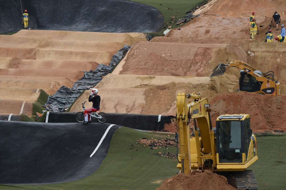 A BMX rider tests the circuit under renovation at the Deodoro complex in Rio de Janeiro on March 11.