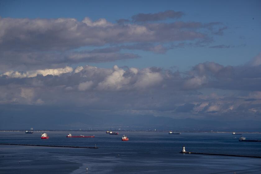 Los Angeles, CA - December 12, 2022: A handful of cargo ships are anchored outside the breakwater of the ports of Los Angeles and Long Beach, far less than the 100 ship backlog of cargo ships at the ports earlier in the year on Monday, Dec. 12, 2022 in Los Angeles, CA. (Brian van der Brug / Los Angeles Times)