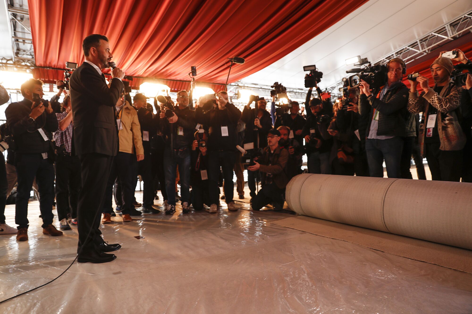 Jimmy Kimmel cracks jokes as he hosts the ceremonial roll out to mark the beginning of Oscar's week on Hollywood Blvd.