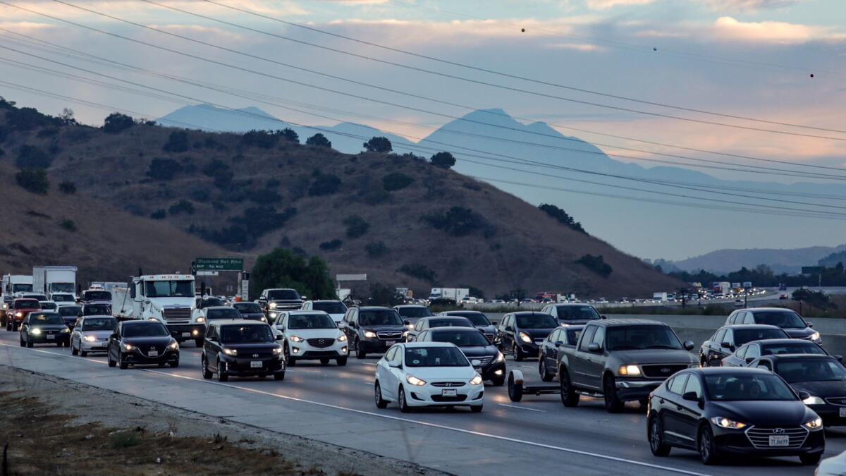 Traffic is backed up on the southbound 57 Freeway between Diamond Bar and Brea because of the fires.