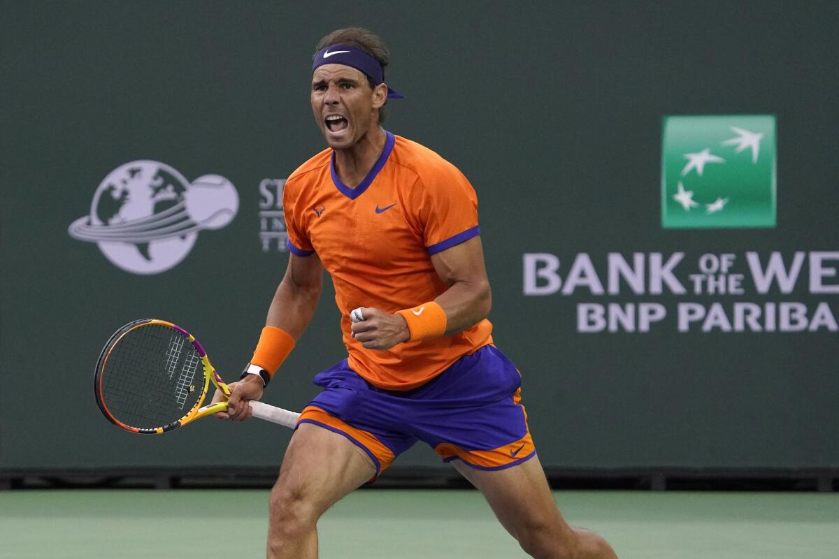 Rafael Nadal celebrates after defeating Carlos Alcaraz at Indian Wells.