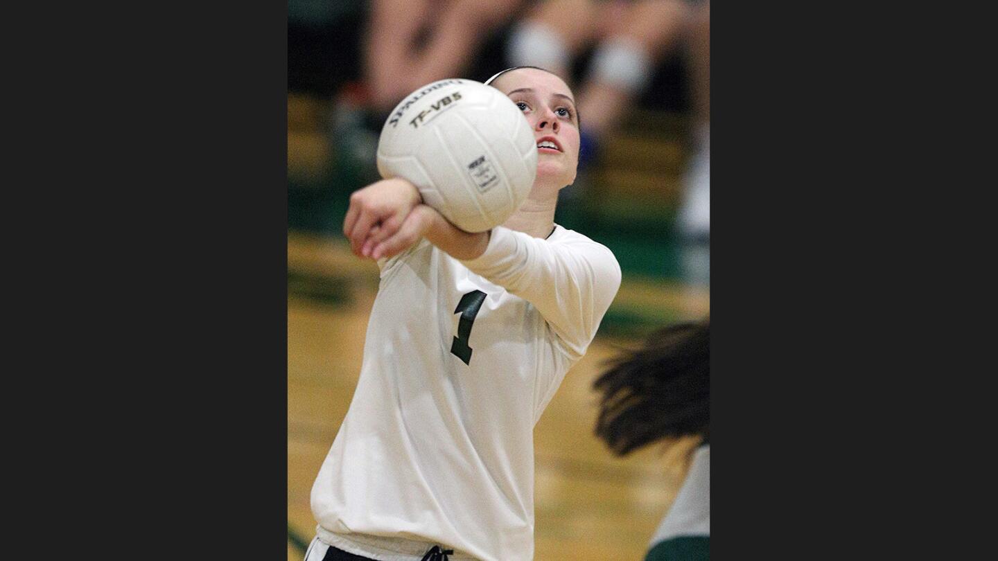 Providence's Isabella Mahan reaches to hit the ball into play against Pomona Catholic in a non-league girls' volleyball match at Providence High School in Burbank on Tuesday, September 5, 2017.