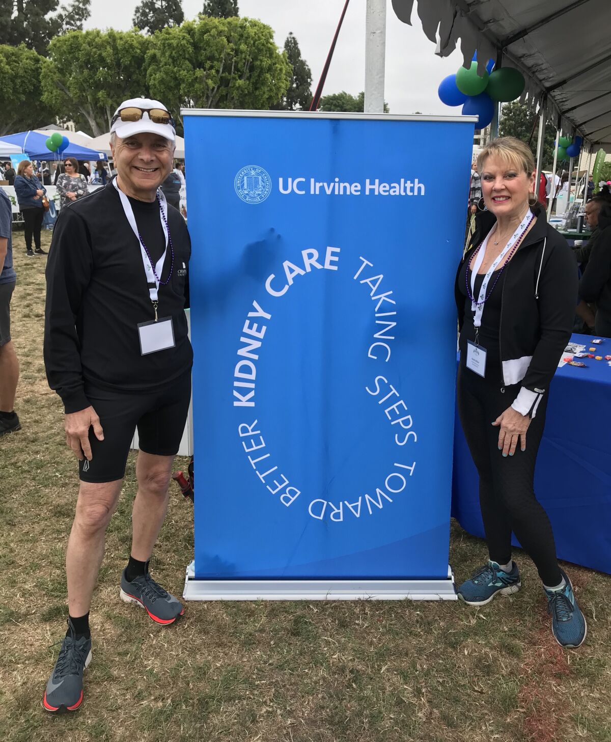 Dr. Jim Doti and Dr. Heidi Miller at a kidney care event at UC Irvine Health.