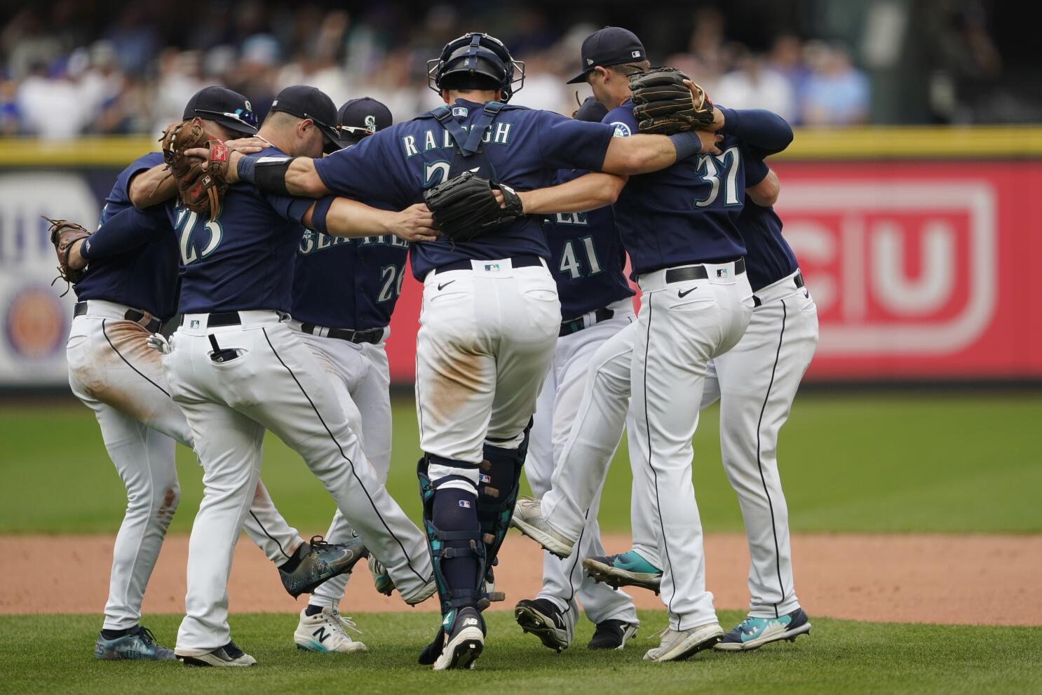 Mariners beat Athletics 5-2 to stay in AL wild-card chase