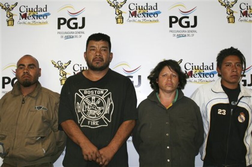 In this image released by the Mexico City Attorney General's Office on Monday Nov. 3, 2008, the alleged kidnappers of a five-year old boy are shown in Mexico City, Sunday, Nov. 2, 2008. Mexico City's top prosecutor said the kidnappers killed a 5-year-old boy by injecting him with acid after his family sought police help. From right to left, 17 year old minor identified as Victor N.N., Yazmin Granados Cureno, Israel Manjarrez Enr�quez and Rutilio Morales Carrera.(AP Photo/PGJ-DF)