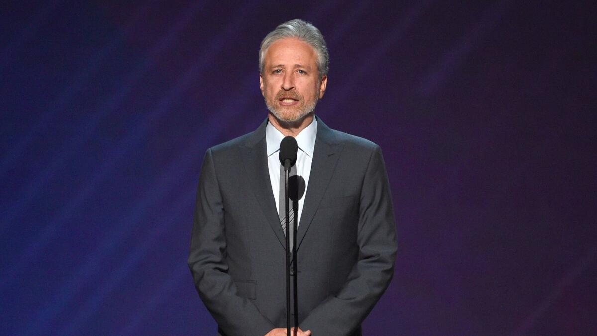 Jon Stewart, seen here presenting at the ESPYS, will return to HBO for his first stand-up special in two decades.