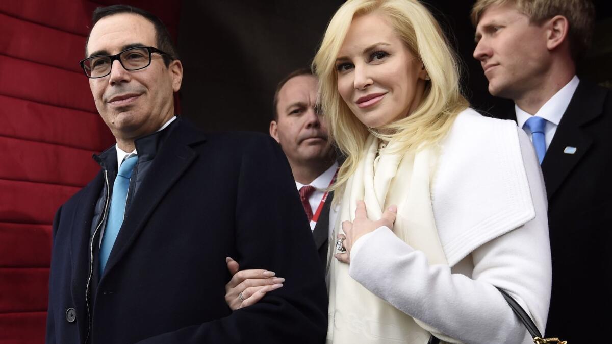 Steve Mnuchin and Louise Linton, who were married June 24, arrive on Capitol Hill for Donald Trump's inauguration as president on Jan. 20.