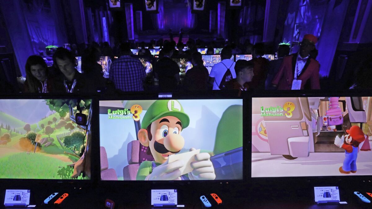 Nintendo's "Luigi's Mansion 3" display and demonstration booth during E3 at the Los Angeles Convention Center.