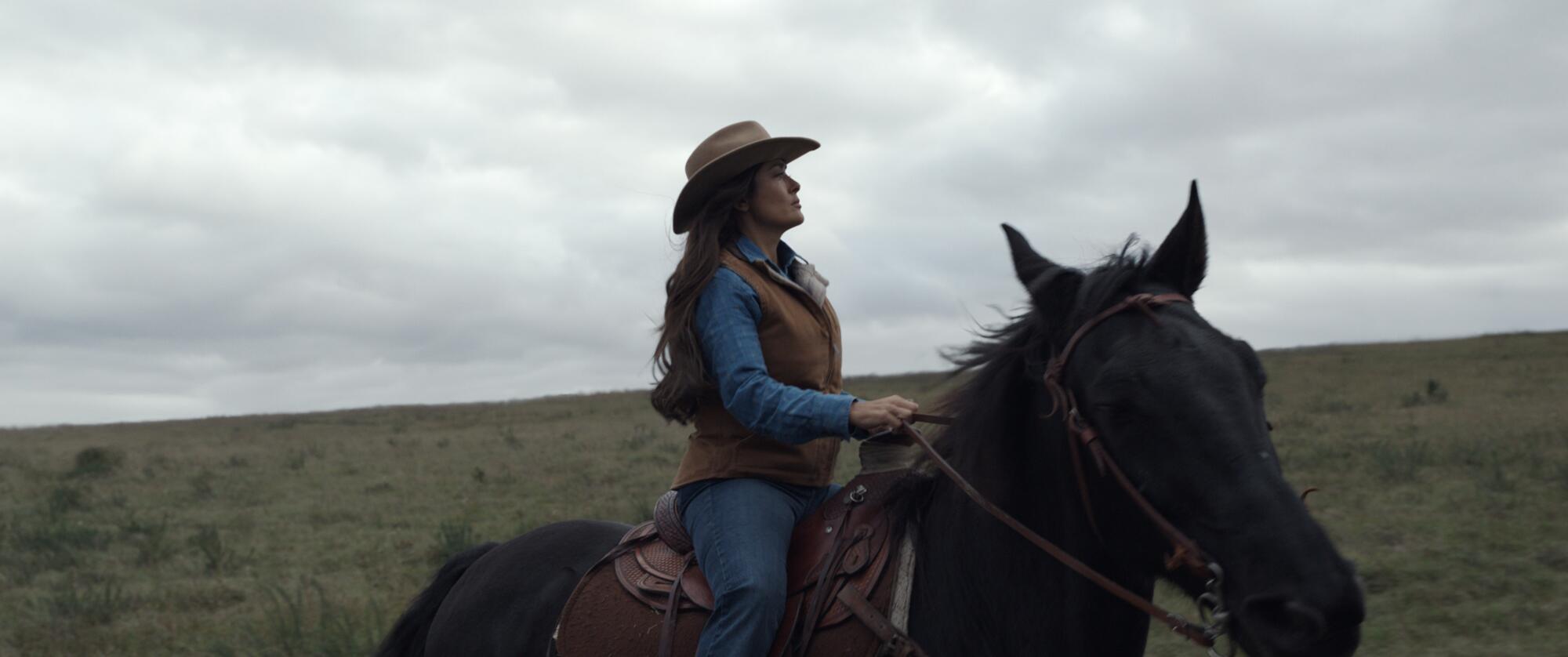 a woman on horseback