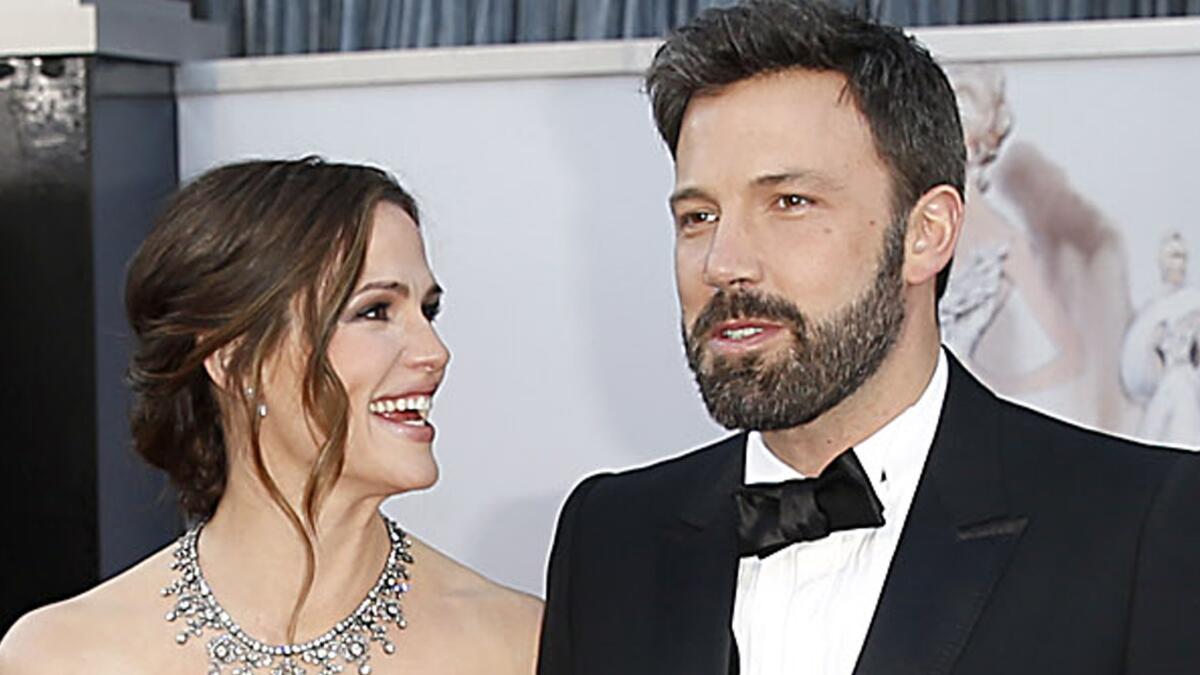Jennifer Garner and Ben Affleck, shown together at the Oscars in 2013, announced Tuesday that they are getting a divorce