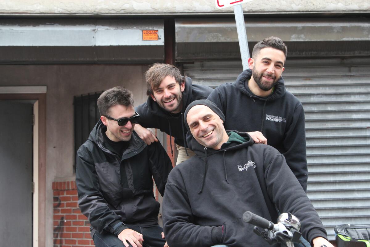 Boston Pedicab drivers, from left: Nicholas Viau, Dylan Ramsey, Christian Matyi and Jesse Lyons.