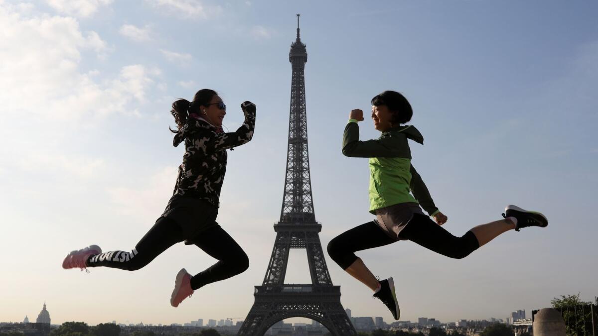 Paris will be more affordable this fall and winter with airfares starting at $599 on Air Tahiti Nui. Want to get a photo like this one? These women jumped simultaneously at the Palais de Chaillot for an Eiffel Tower souvenir photo last Wednesday.