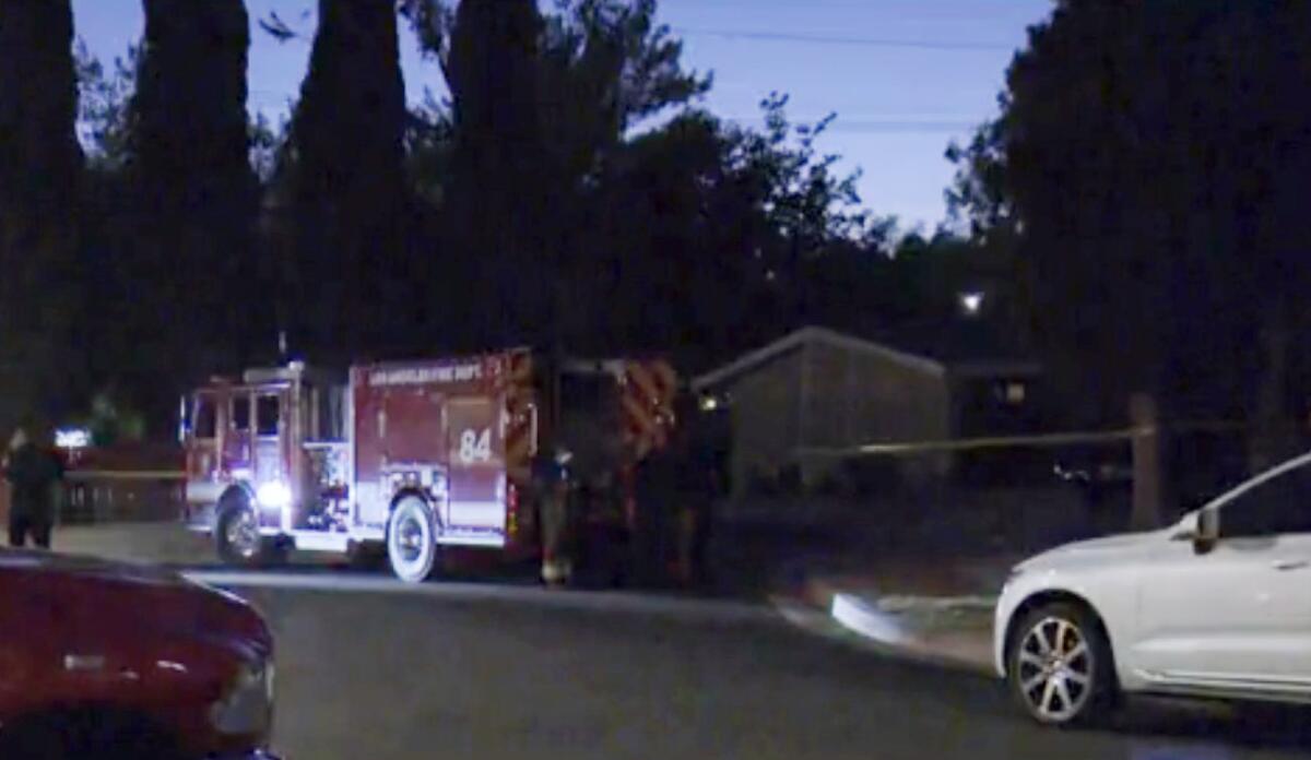 Emergency vehicles outside a house