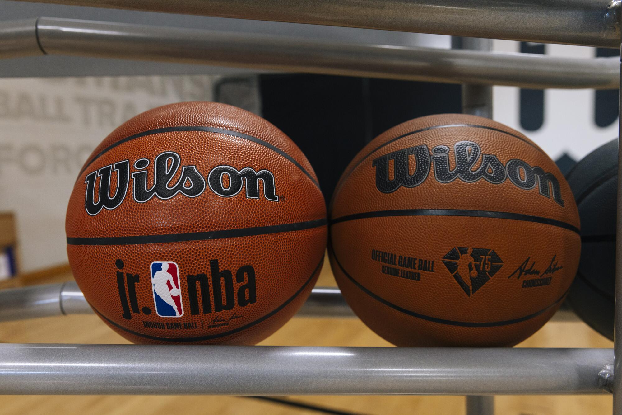 A Jr. NBA ball and a commemorative NBA ball on the test court in the Wilson Innovation Center 