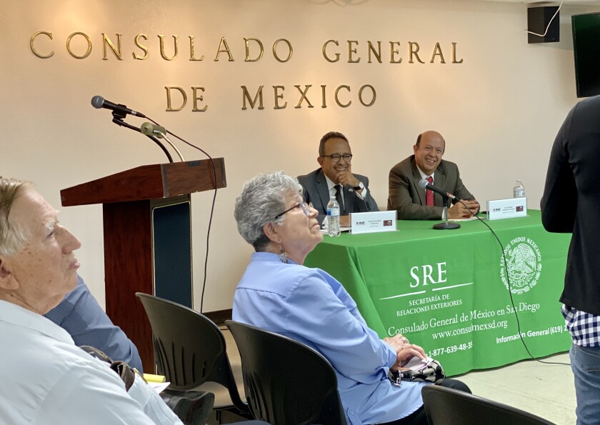 Consul General Carlos González-Gutiérrez (center-left) with Election Counselor Enrique Andrade during a talk with the community at the Consulate of Mexico in San Diego on Thursday, September 26, 2019. 