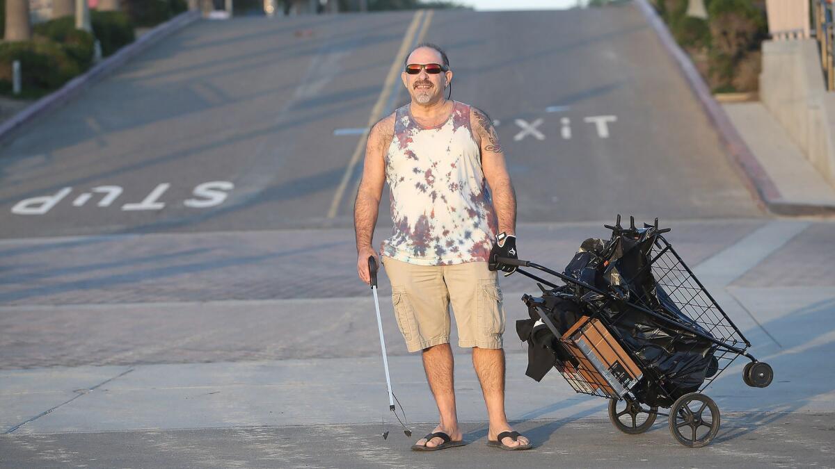 Huntington Beach resident David Hubbard said he is proud to collect trash while on walks on the bike path, near the pier and in the local parks.