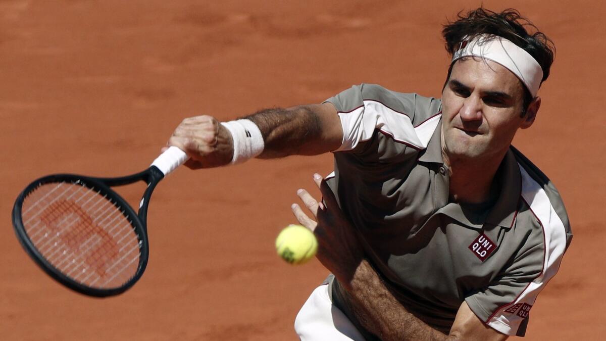 Roger Federer makes a shot during his victory over Leonardo Mayer at the French Open on June 2.