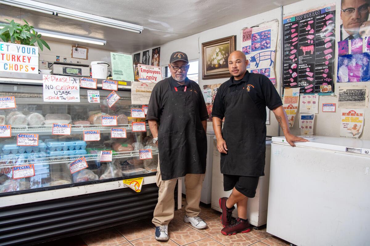 Walter Hart Jr. and Sr., the father-son duo behind Best Buy Meats in Hyde Park.