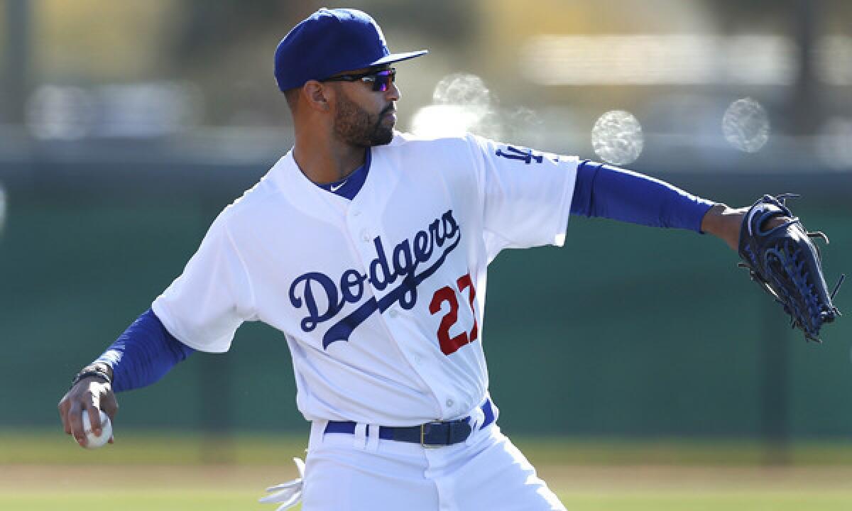 Dodgers outfielder Matt Kemp takes part in a practice session at the team's spring training facility in Glendale, Ariz., on Friday.