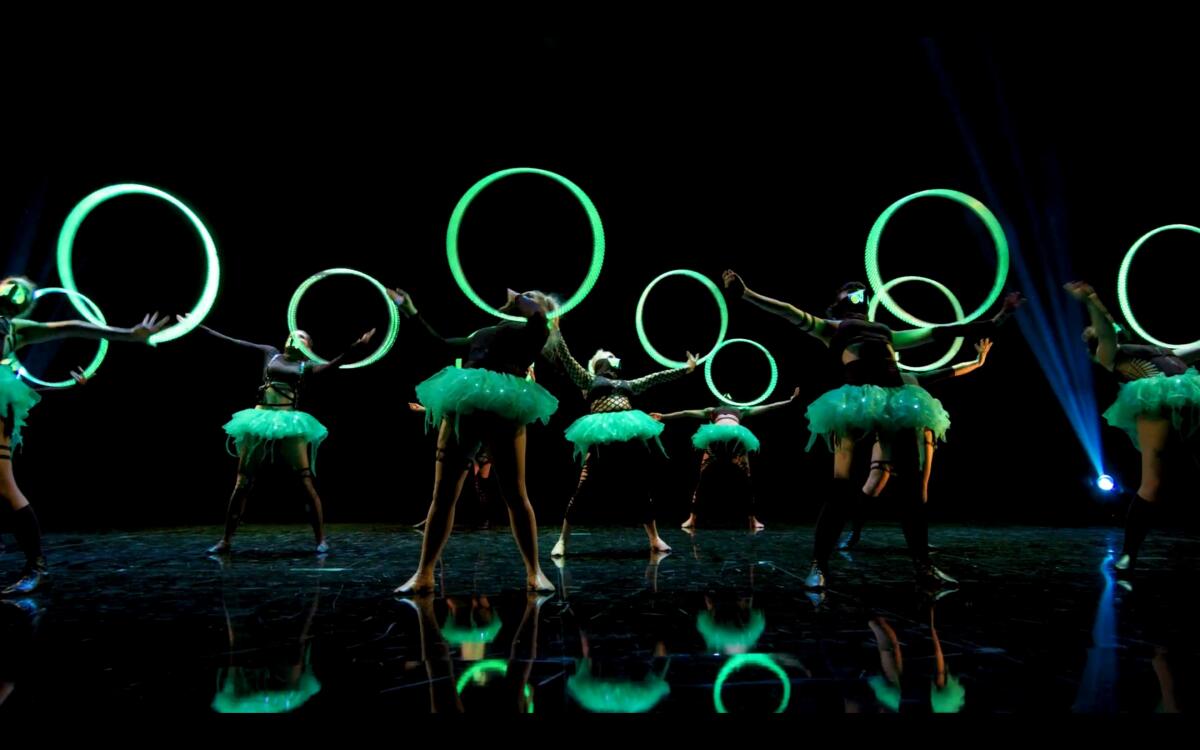 A screenshot of "World Stool Still Group Piece" by the Lumia Dance Company run by Dr. G. Sofia Nelson. 