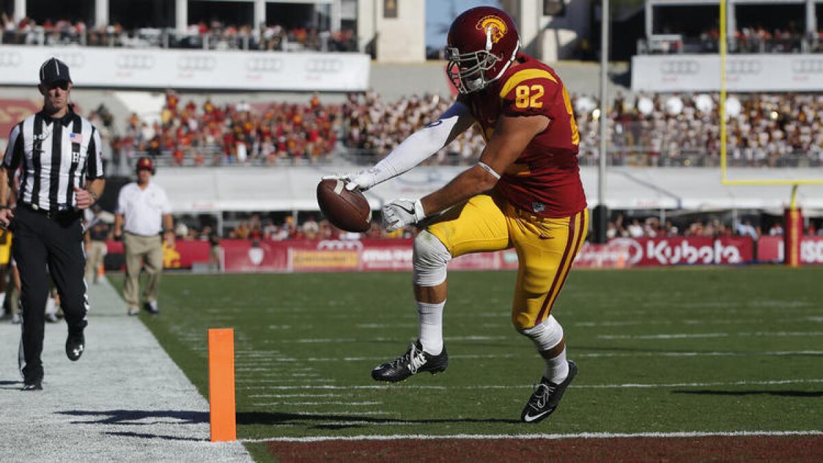 USC tight end Tyler Petite scores the go-ahead touchdown against Colorado in the fourth quarter Saturday. To see more images from the game, click on the photo above.