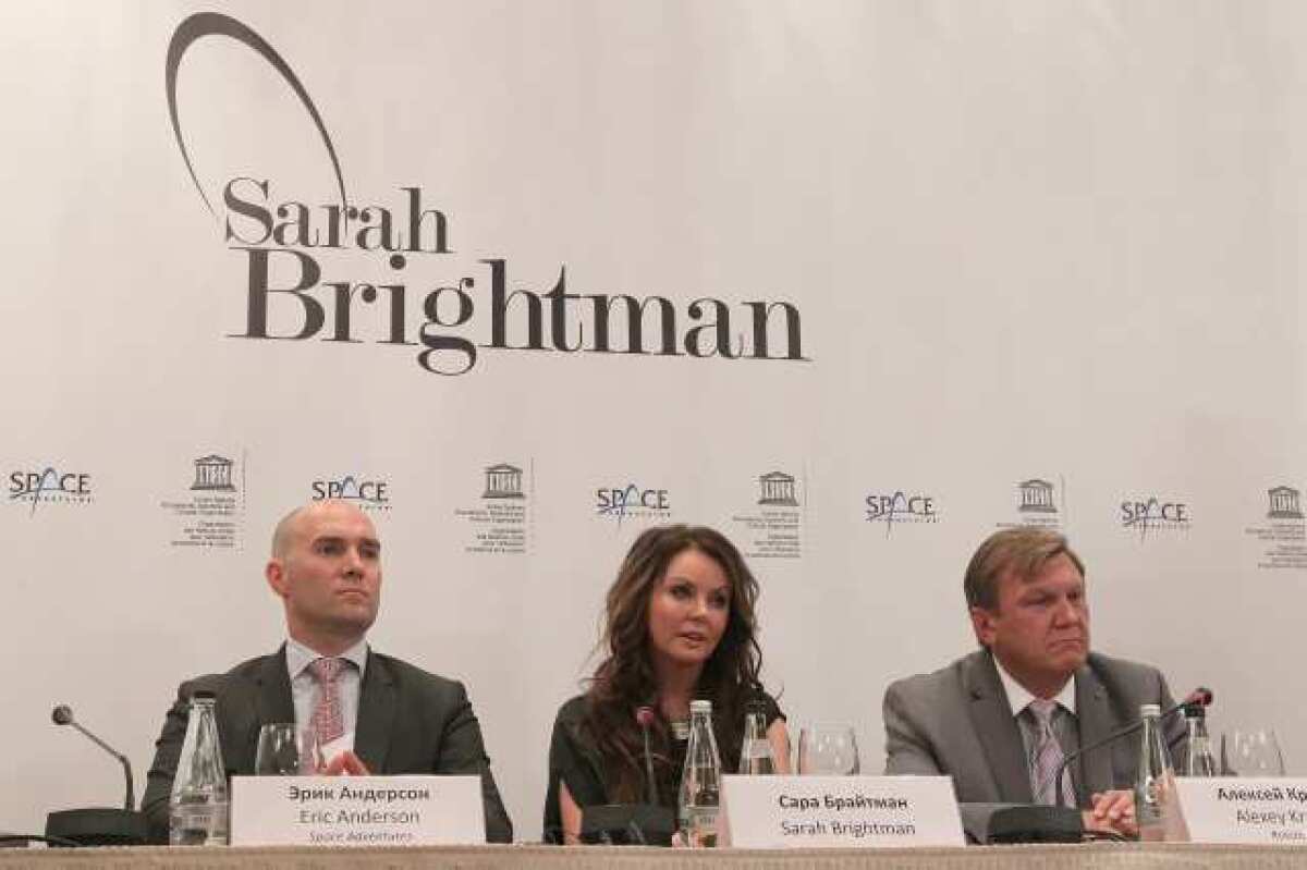 Singer Sarah Brightman at a news conference in Moscow to announce her trip to the International Space Station.