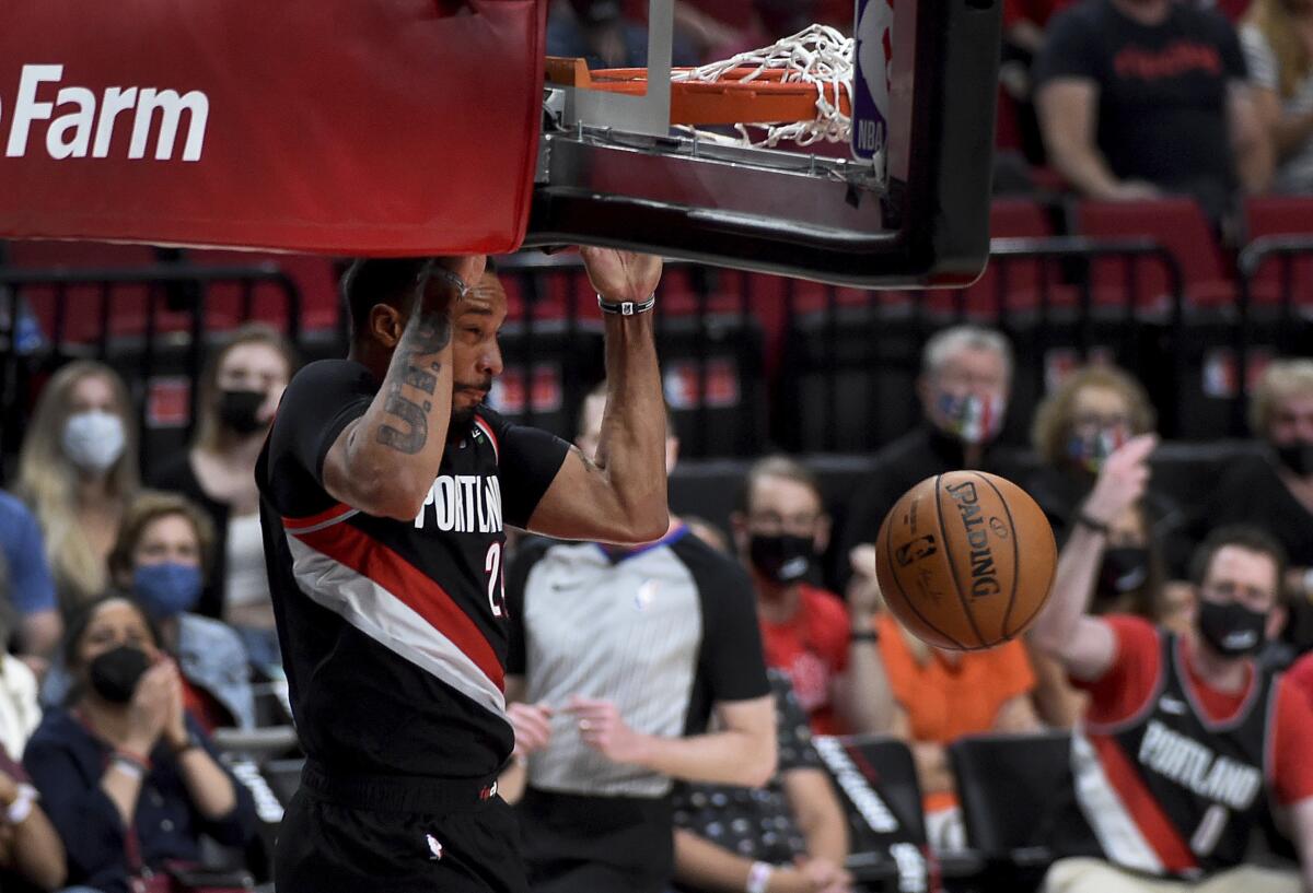 The Trail Blazers' Norman Powell dunks the ball during the second half May 29, 2021.