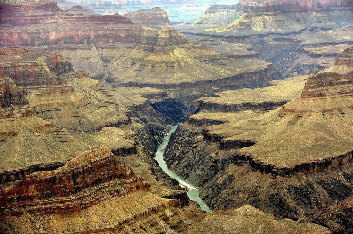 The Colorado River flows through the Grand Canyon, as seen from Mohave Point on the South Rim. The National Park Service says a proposed housing development would have dire consequences for the park's scarce water supply.