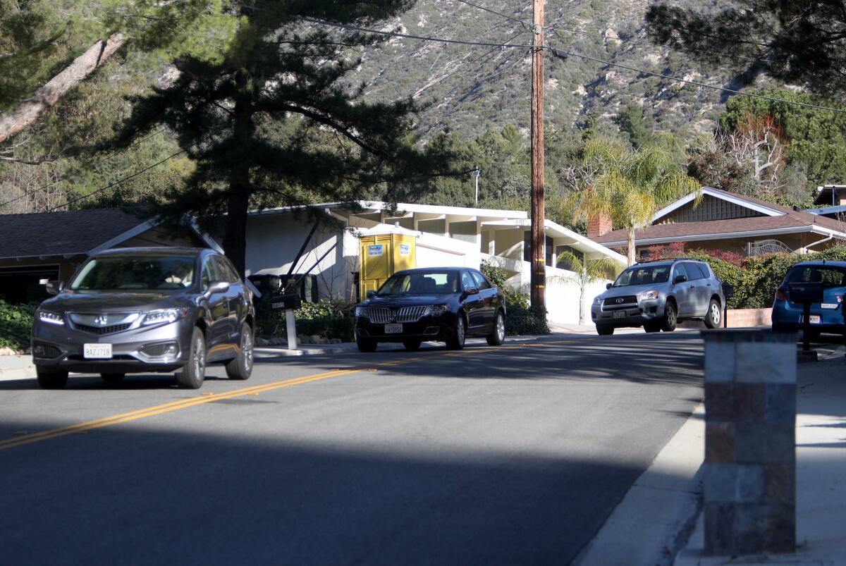 Residents evacuate in their cars during a fire drill conducted in the Paradise Valley area of La Cañada Flintridge, where vehicle access in and out of the neighborhood is limited, on Saturday, Jan. 18, 2020.