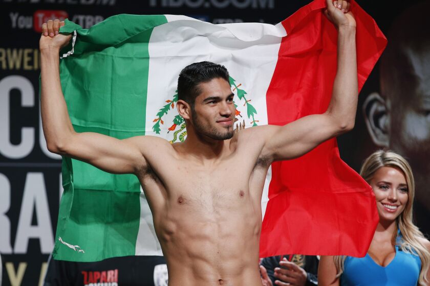Gilberto Ramirez, of Mexico, poses during a weigh-in, Friday, April 8, 2016, in Las Vegas. Ramirez is scheduled to fight Arthur Abraham, of Germany, in a WBO super middleweight title fight Saturday in Las Vegas. (AP Photo/John Locher)