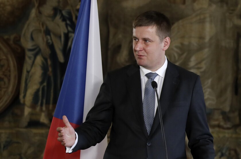In this picture taken Tuesday, Feb. 4, 2020, Czech Republic's Foreign Minister Tomas Petricek talks to the media during a press conference in Prague, Czech Republic. Petricek was fired on Monday April. 12, 2021, in a government re-shuffle less than half a year before the parliamentary election. The move came after Foreign Minister Tomas Petricek failed to beat Interior Minister Jan Hamacek in a vote to become the new leader of the Social Democrats at their party congress last week.(AP Photo/Petr David Josek)