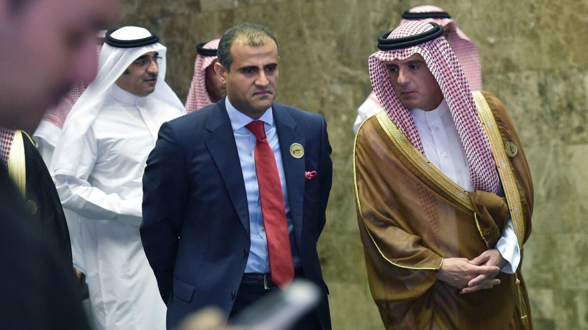 Saudi Foreign Minister Adel Jubeir, right, escorts Yemen's Deputy Foreign Minister Mohammed Hadrami as they arrive at a December meeting in Riyadh of seven Arab and African states surrounding the Red Sea.