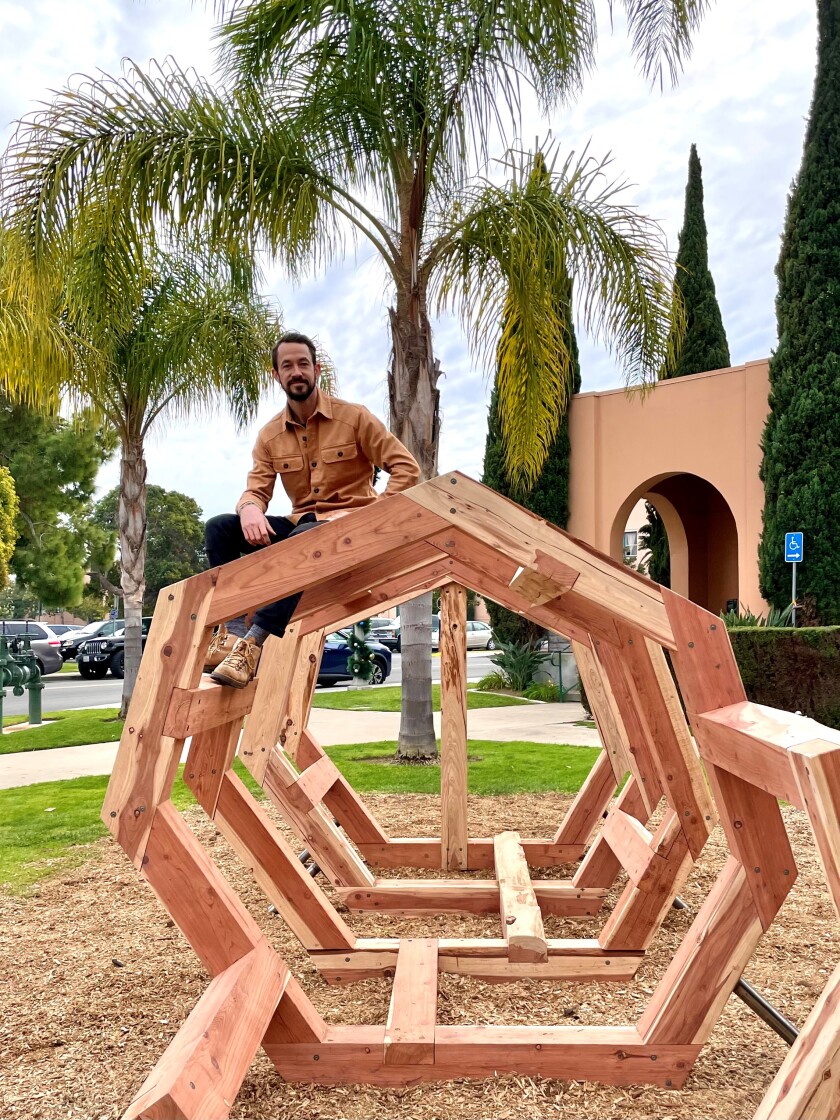 Sculptor and multimedia artist Trevor Amery shows his creation “Archive and Witness” at Liberty Station.