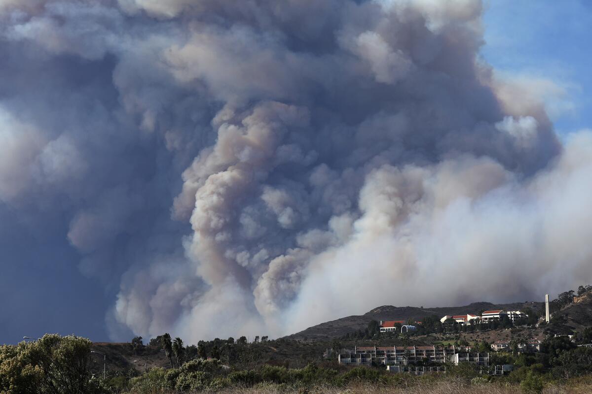 Smoke from the Woolsey fire looms over Pepperdine University and other structures in Malibu last week.