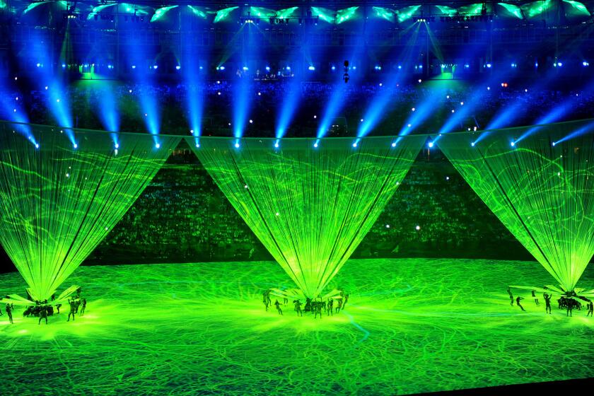 Dancers perform during the opening ceremony of the 2016 Olympics on Friday in Rio de Janeiro.