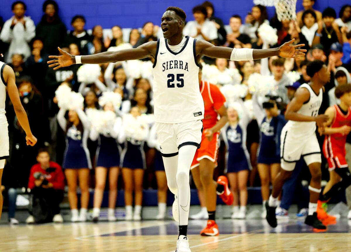Seven-footer Majok Chuol of Sierra Canyon shows off his excitement during his team's 74-68 win over Harvard-Westlake.