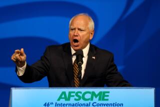 LOS ANGELES, CA - AUGUST 13, 2024 - Governor Tim Walz, vice presidential nominee, delivers remarks at the AFSCME's 46th International Convention in Los Angeles on August 13, 2024. Walz was joined by AFSCME President Lee Saunders and public service workers from all over the U.S. (Genaro Molina/Los Angeles Times)