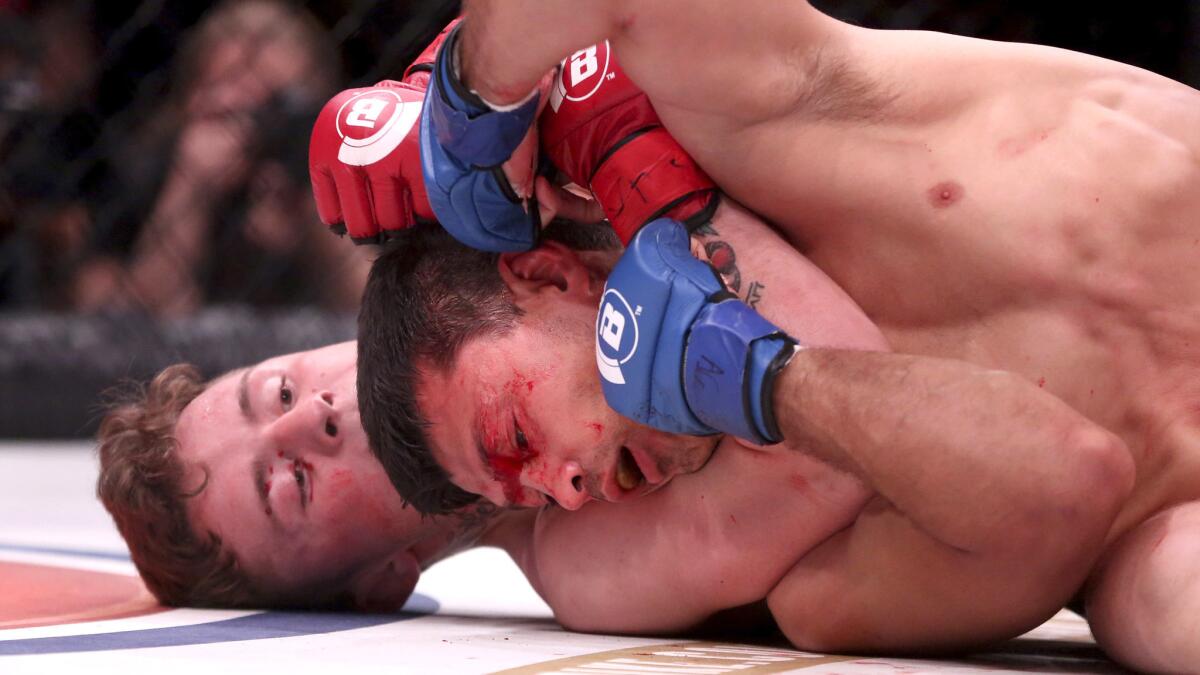 James Gallagher applies the fight-ending rear naked choke against Chinzo Machida at Bellator NYC.
