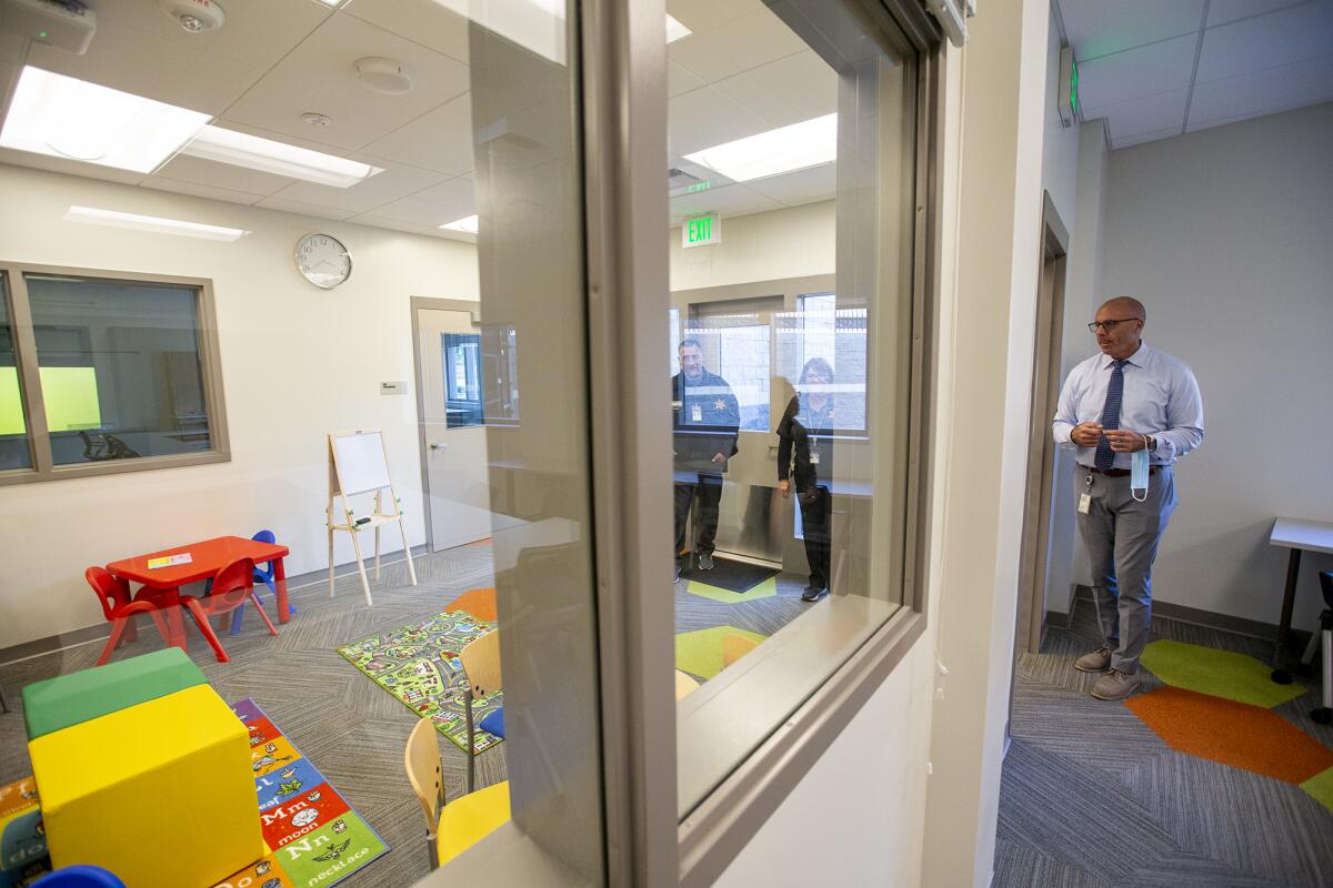 Orange County Probation staff show off an activity room in the Multipurpose Rehabilitation Center at O.C. Juvenile Hall.