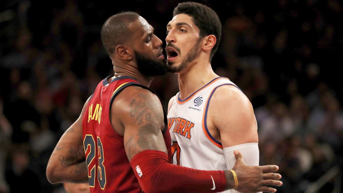 Cleveland's LeBron James and New York's Enes Kanter exchange words at Madison Square Garden on Nov. 13