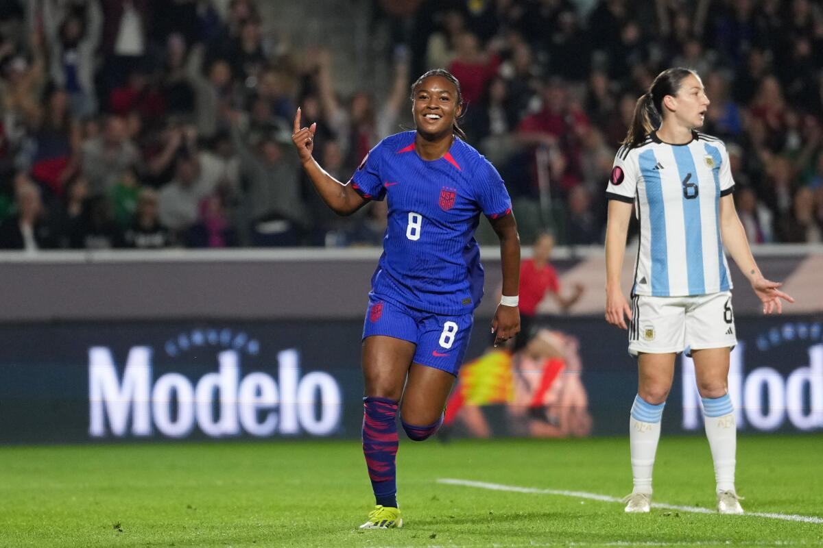 Jaedyn Shaw is all smiles as she runs across the field after scoring against Argentina on Friday night.