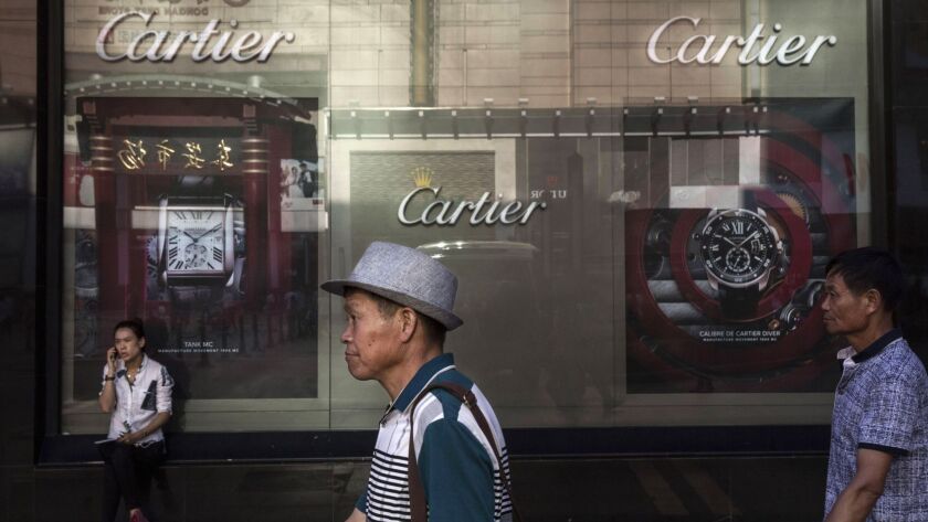 A Cartier store in an upscale shopping district of Beijing, where per-capita GDP is slightly over $53,000 — similar to Switzerland and the U.S. — while in some rural provinces GDP was below $10,000 — nearer that of Guatemala.
