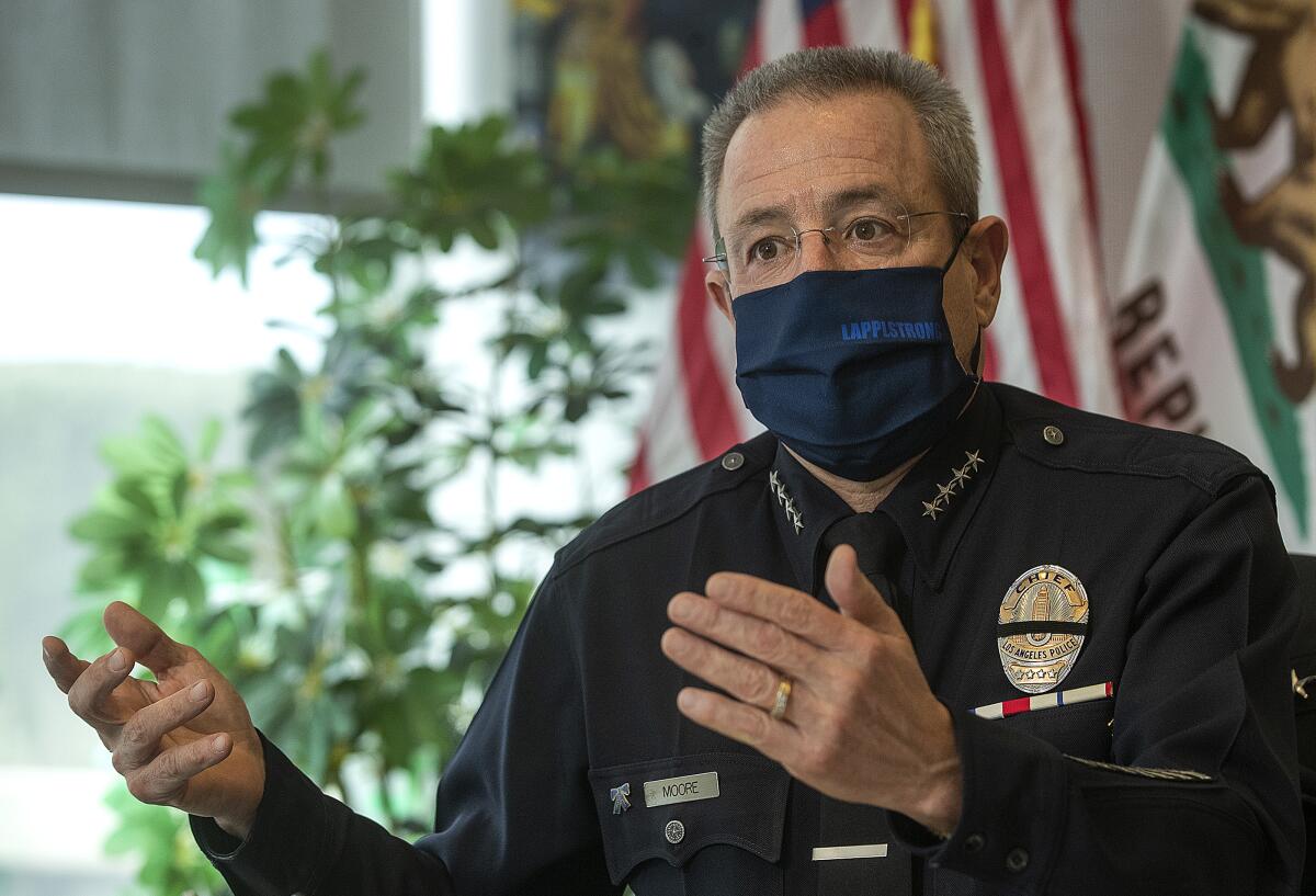 LAPD Chief Michel Moore wearing a face mask