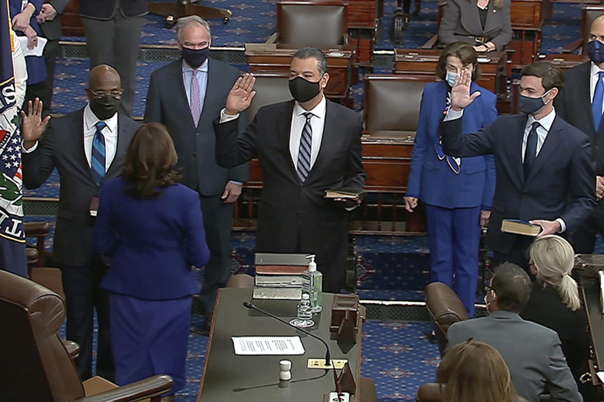 Vice President Kamala Harris swears in Sens. Raphael Warnock, Alex Padilla and Jon Ossoff.