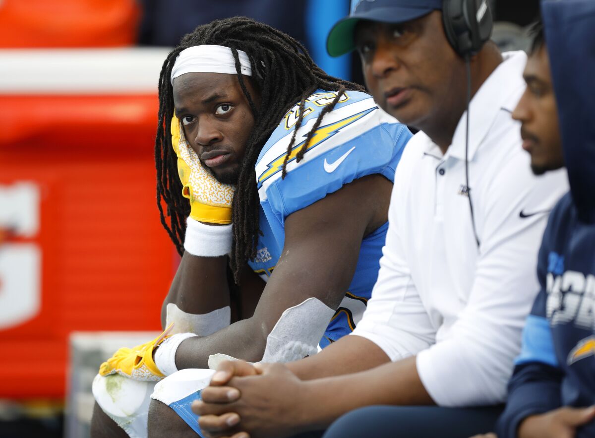 hargers running back Melvin Gordon sits on the bench.