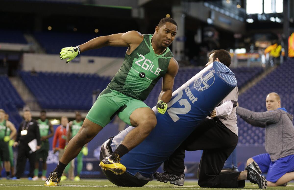 Former USC linebacker Hayes Pullard runs a drill during the NFL Scouting Combine on Sunday in Indianapolis.