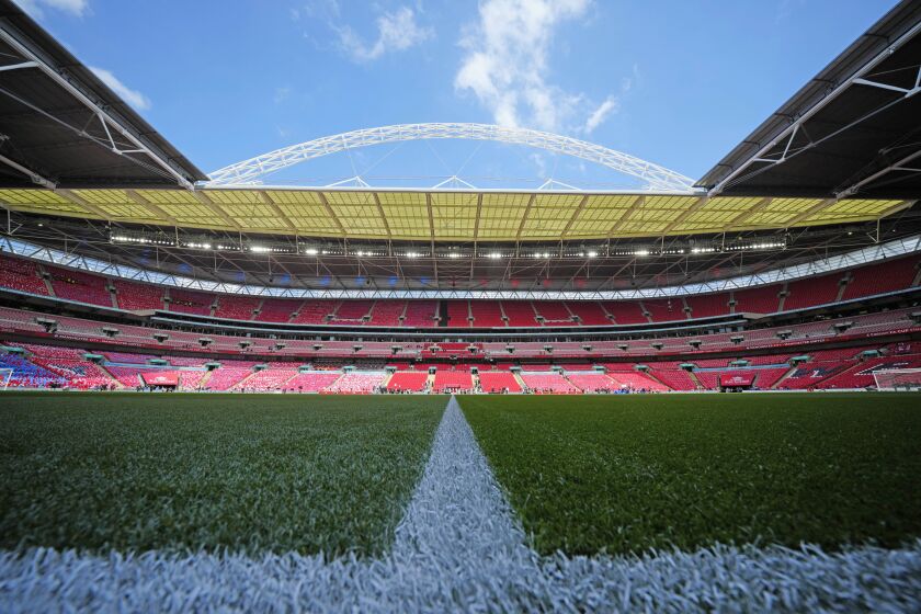 View at the lawn of Wembley Stadium before the English FA Cup final soccer match between Manchester City and Manchester United at Wembley Stadium in London, Saturday, June 3, 2023.(AP Photo/Jon Super)